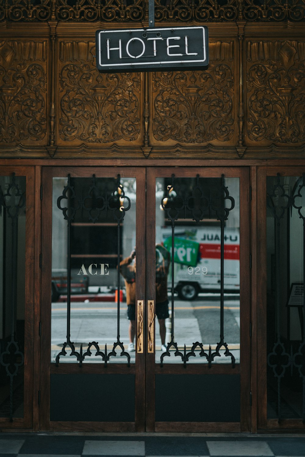 brown wooden cabinet with mirror