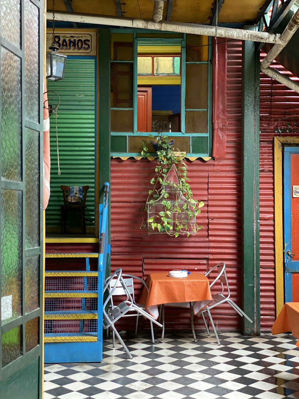 red and blue wooden house