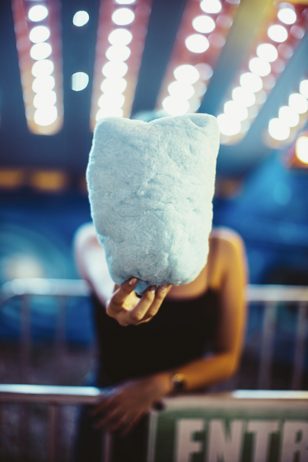 person holding white stone fragment