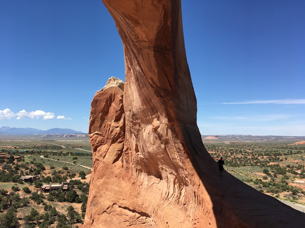 brown rock formation under blue sky during daytime