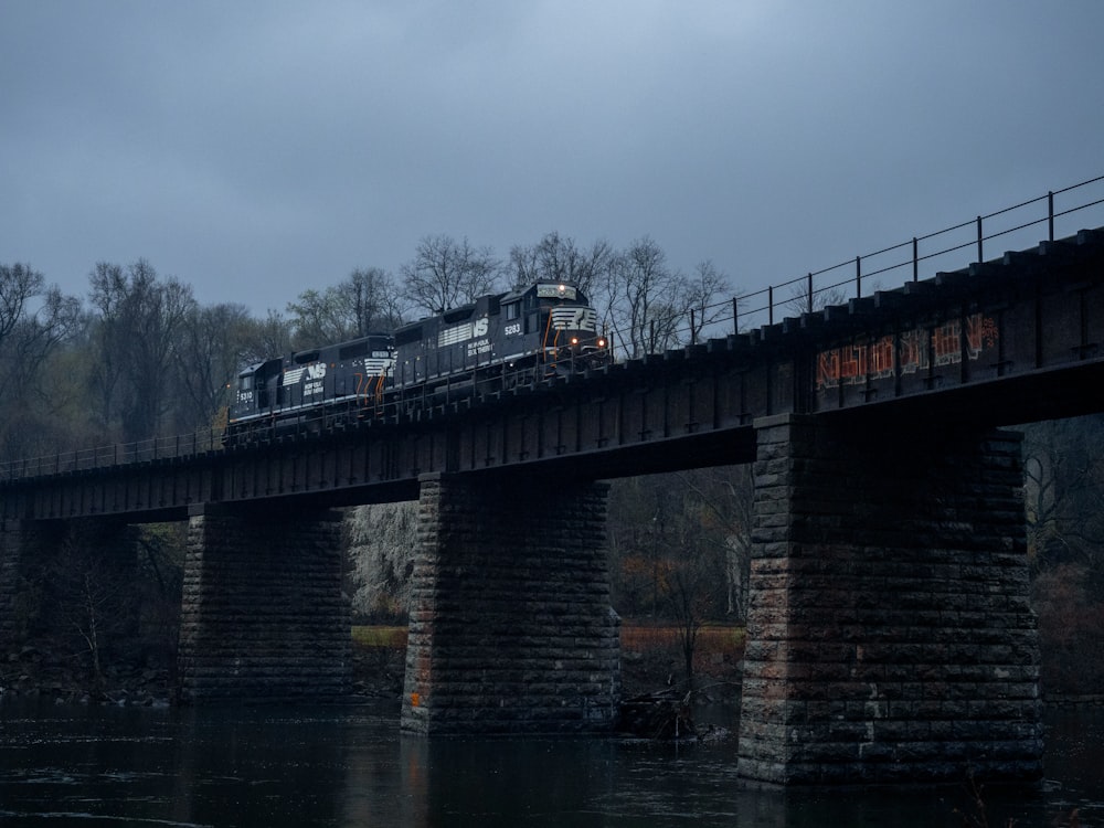 brown and black bridge over water