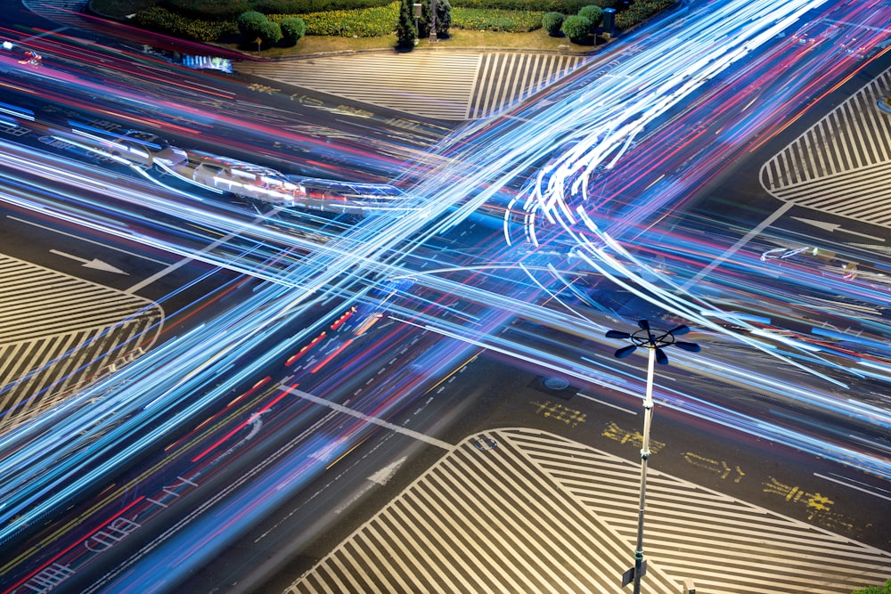 time lapse photography of cars on road during night time