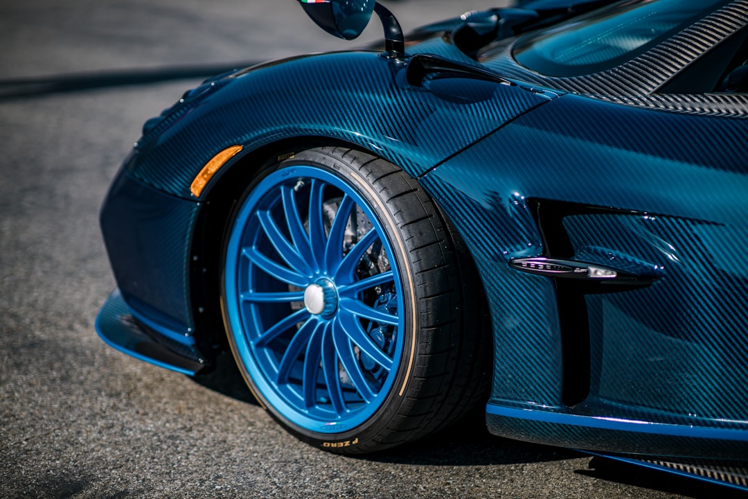 blue bmw m 3 on road during daytime