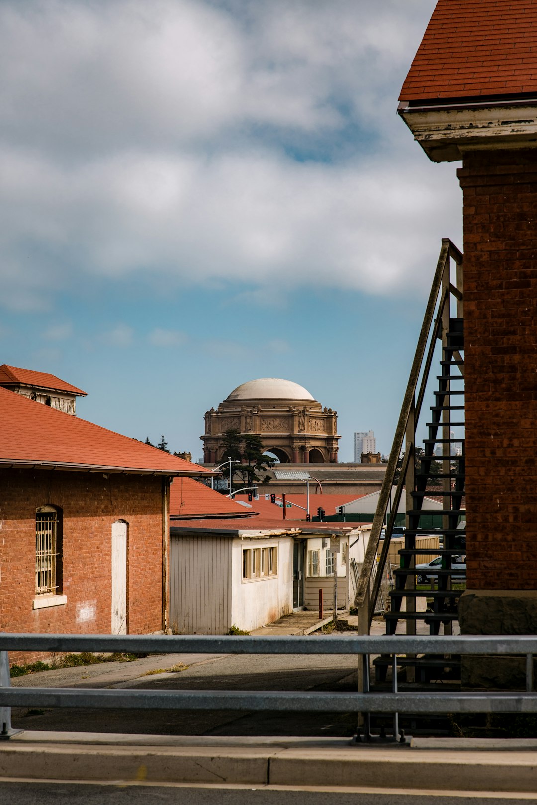 brown brick building under blue sky during daytime