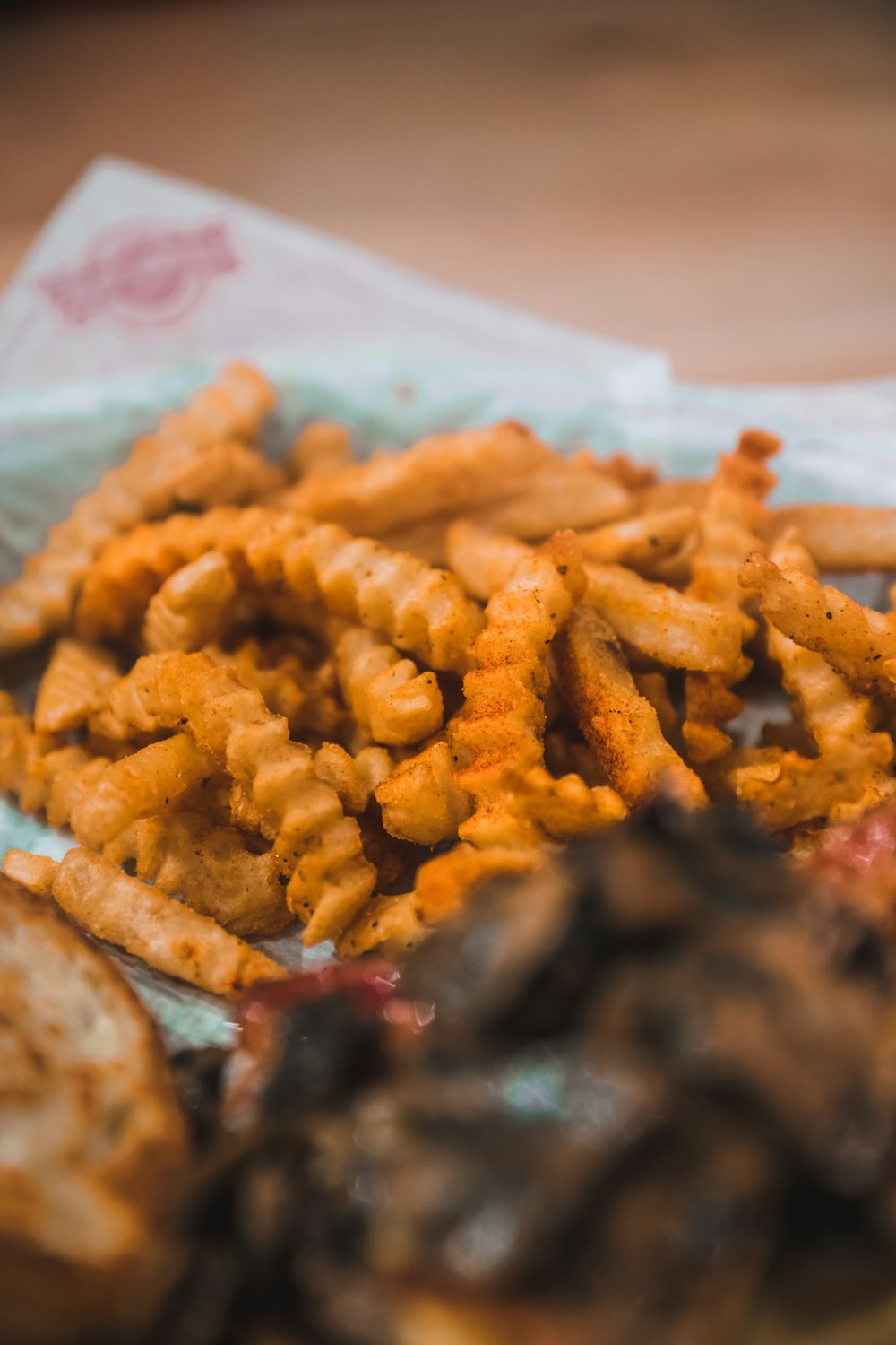 fried fries on white paper