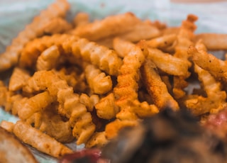 fried fries on white paper