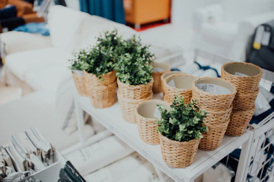 Close-up of nesting storage baskets filled with colorful household items.
