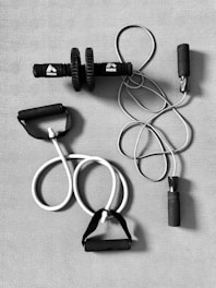 black and silver bluetooth earphones