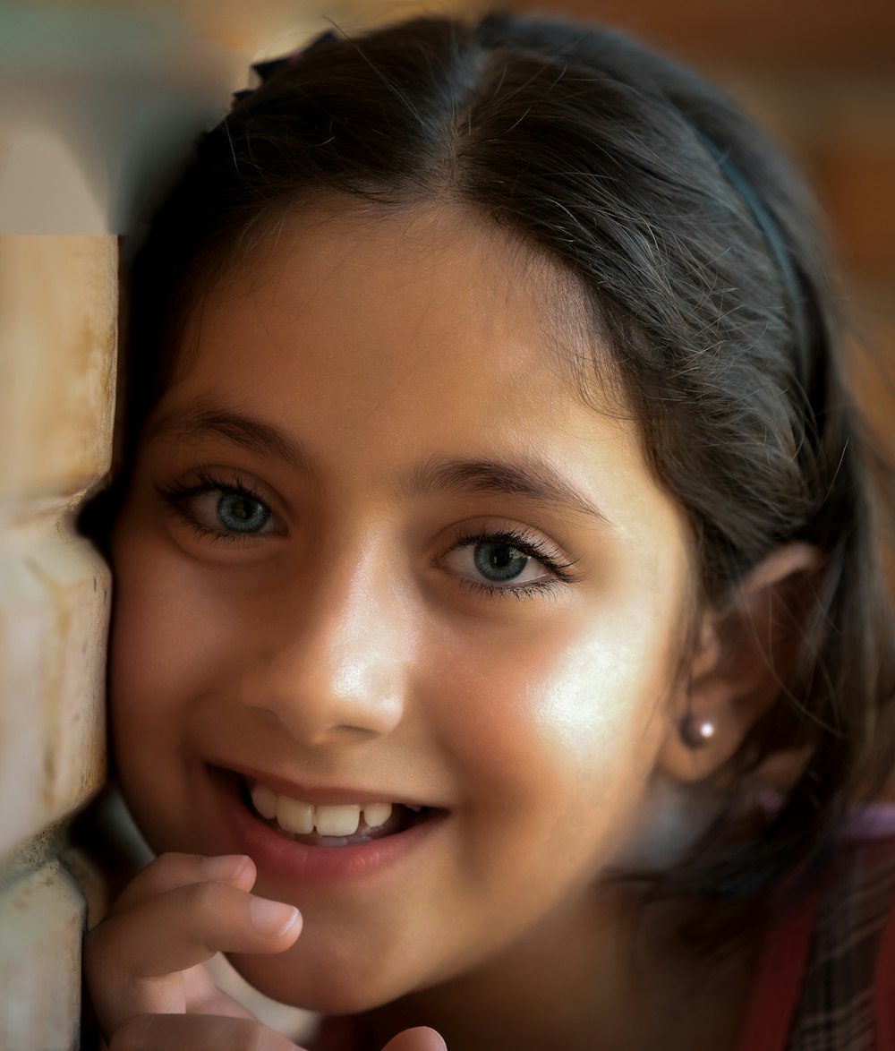 girl smiling in front of the camera