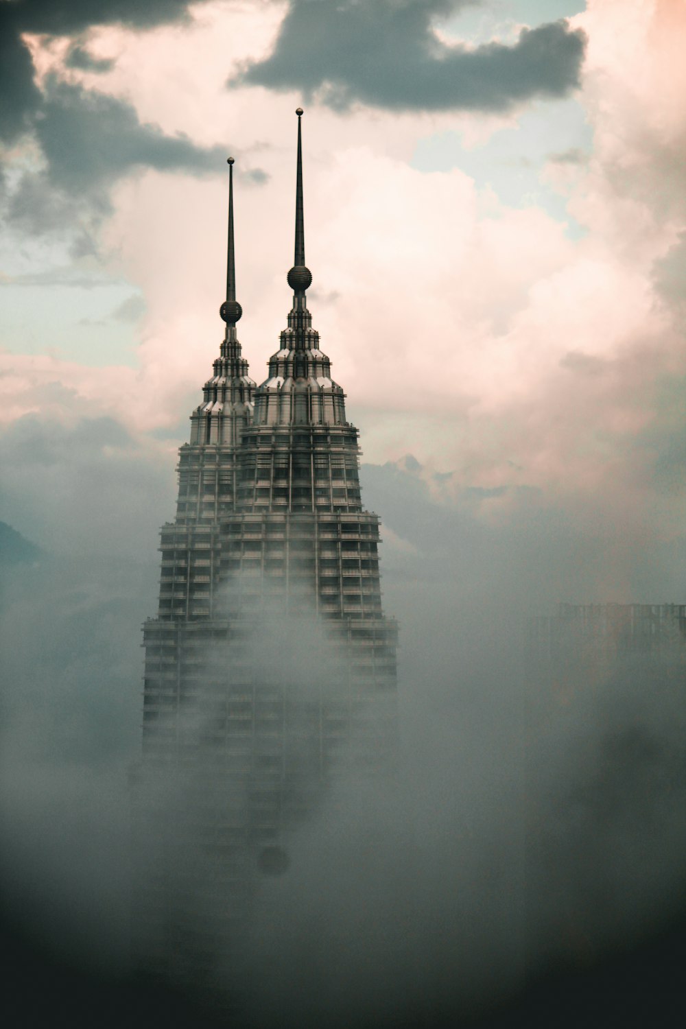 high rise building covered with fog