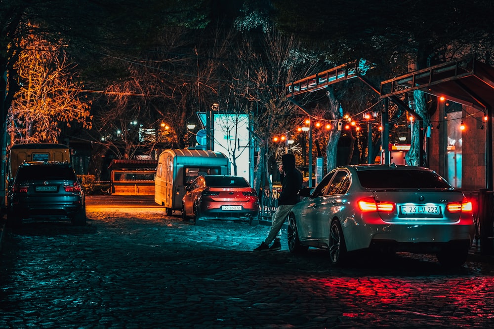 cars parked on street during night time