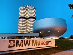 a tall building sitting next to a large sign