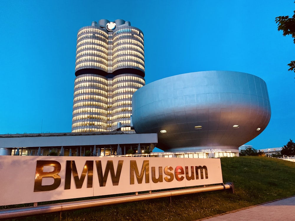 a tall building sitting next to a large sign