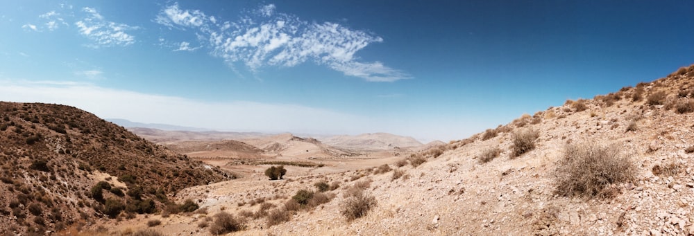 brown mountain under blue sky during daytime