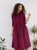 woman in red long sleeve dress