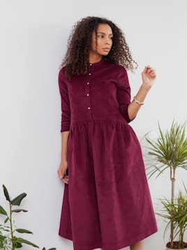 woman in red long sleeve dress