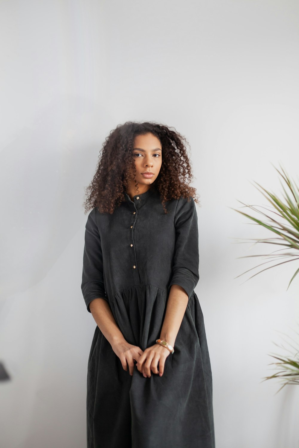 woman in black button up long sleeve shirt