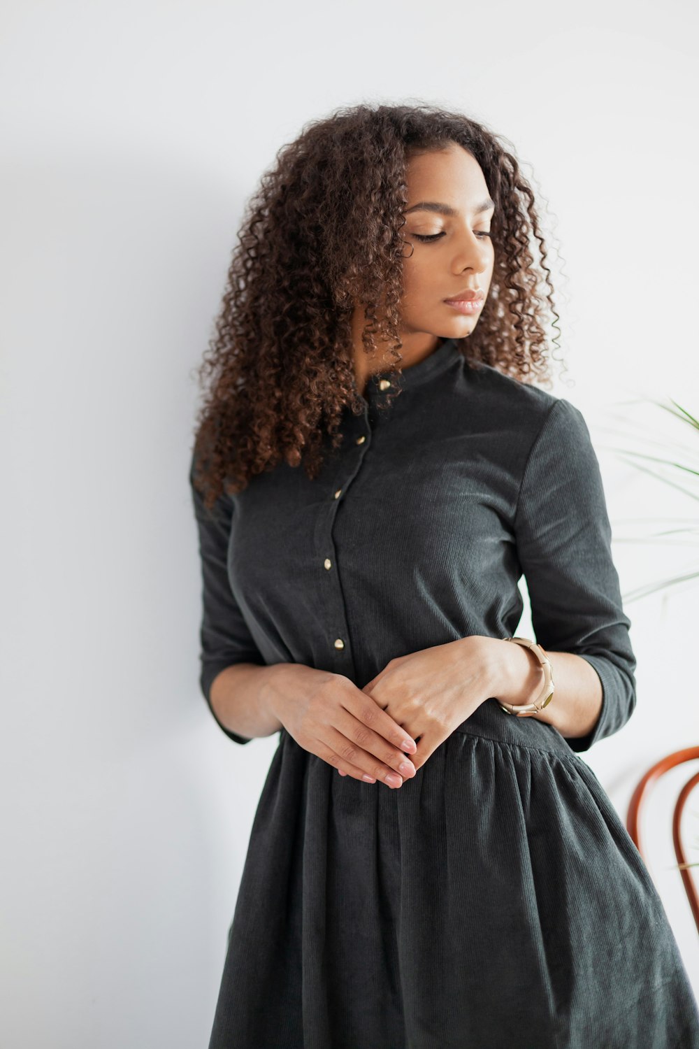 woman in black button up long sleeve shirt