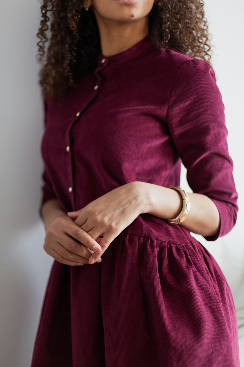 woman in red long sleeve dress