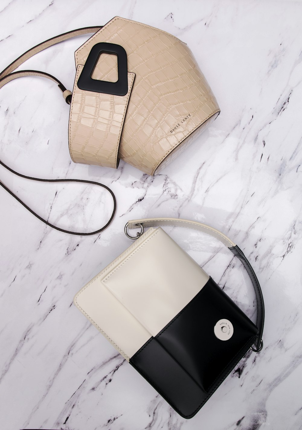 black and white leather sling bag