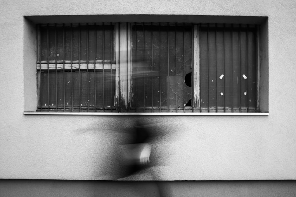 grayscale photo of window blinds