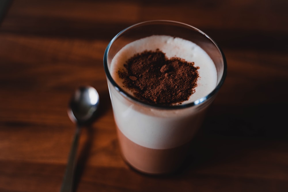 white ceramic cup with brown powder