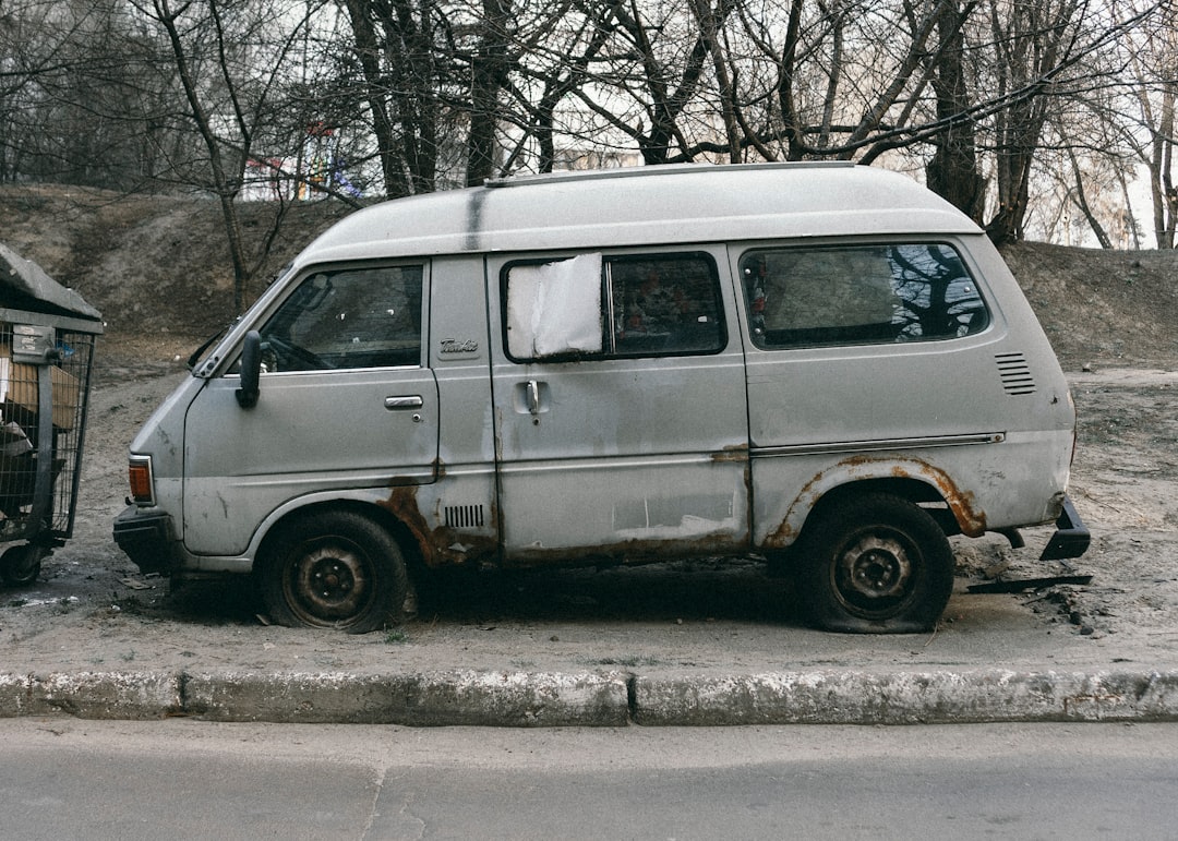 white van parked on the side of the road