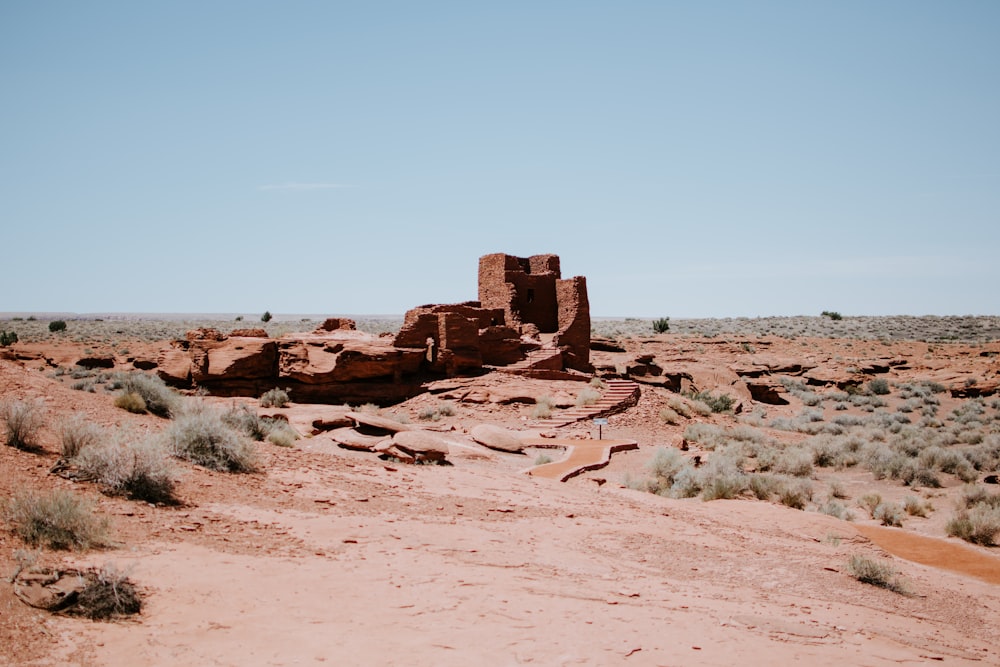 brown rock formation under blue sky during daytime