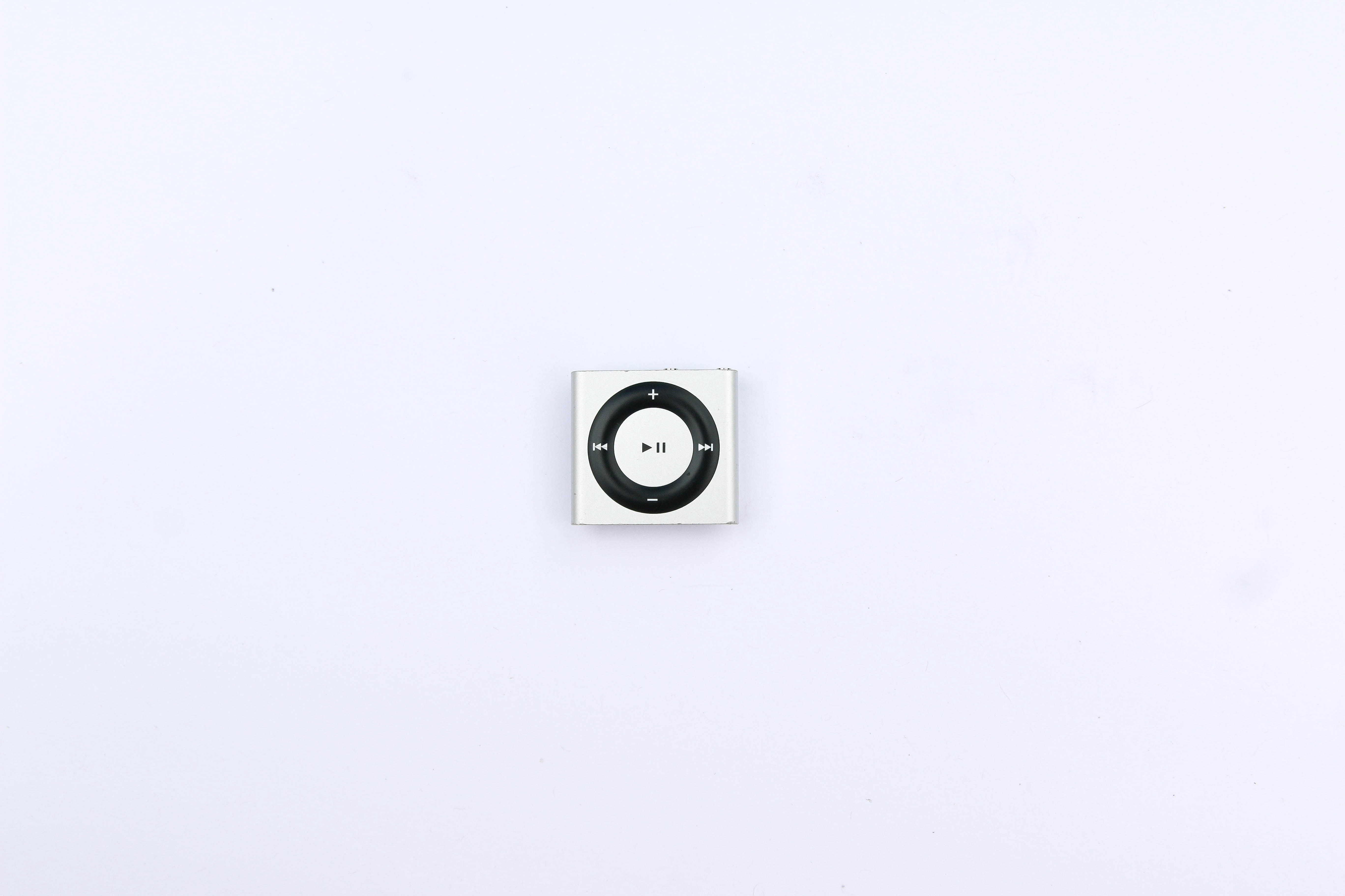 white and black round wall mounted device
