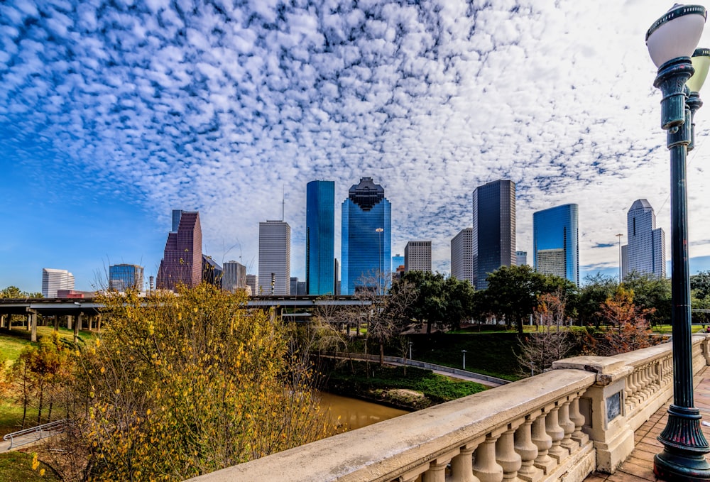 city skyline under blue sky during daytime