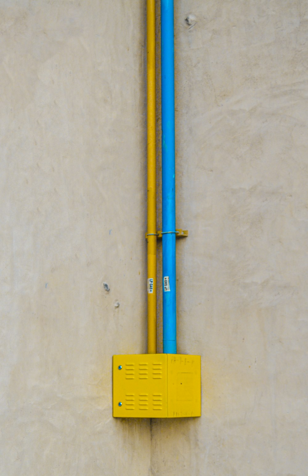 blue and yellow metal rod