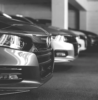 grayscale photo of car on road