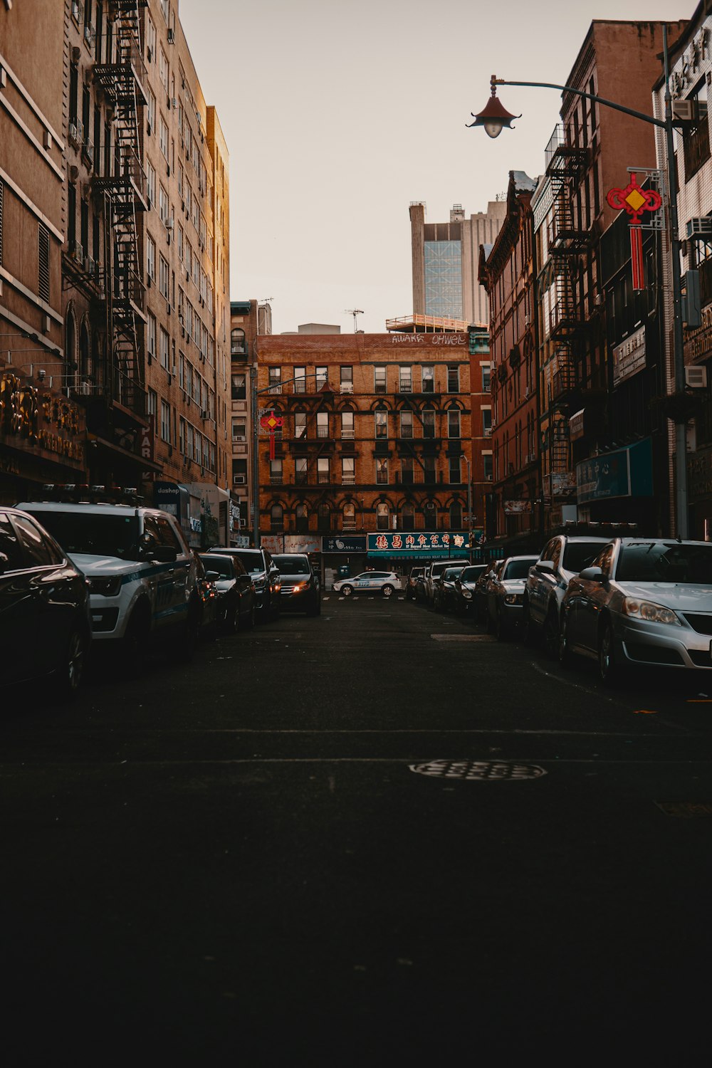 cars parked on side of the road during daytime