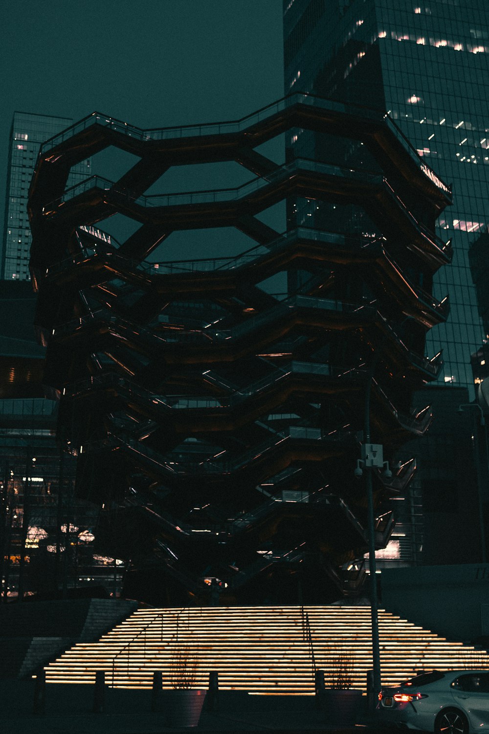 black and gray glass building during night time