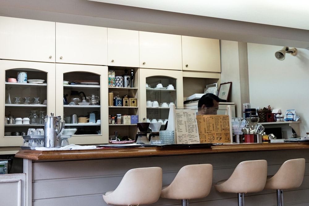 brown wooden cabinet with mirror