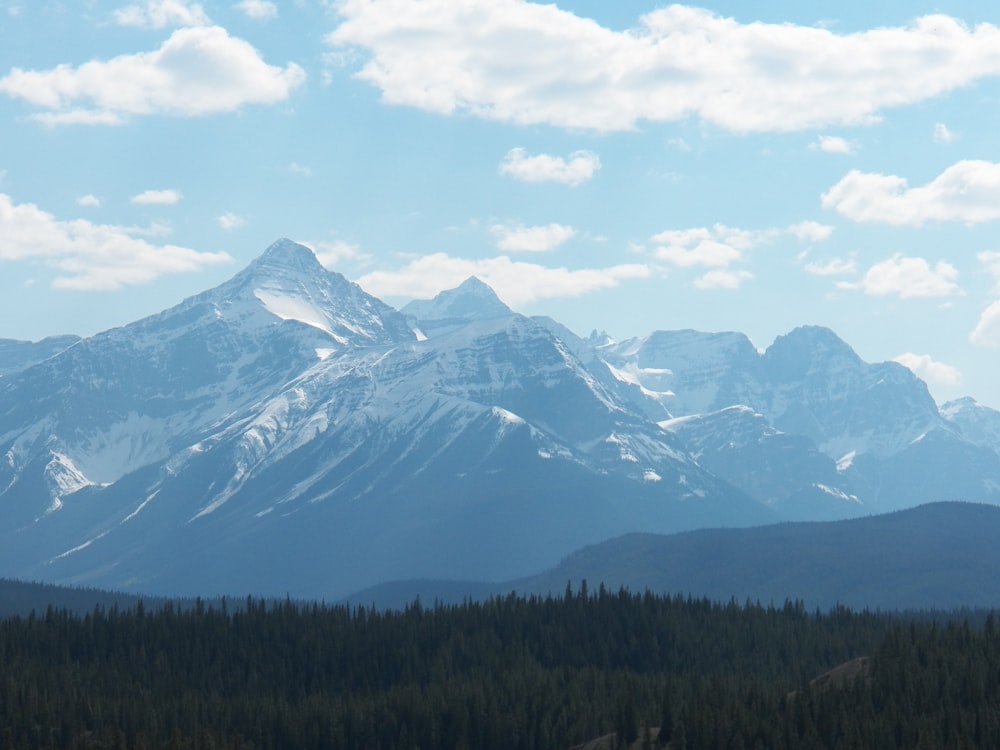 snow covered mountain under blue sky during daytime