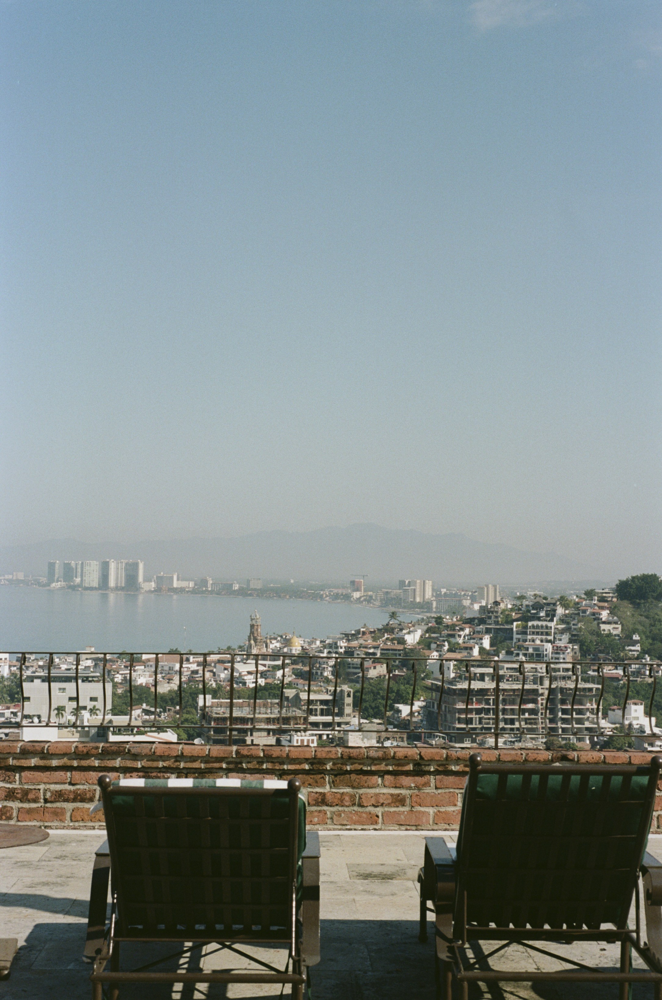 city skyline under gray sky during daytime