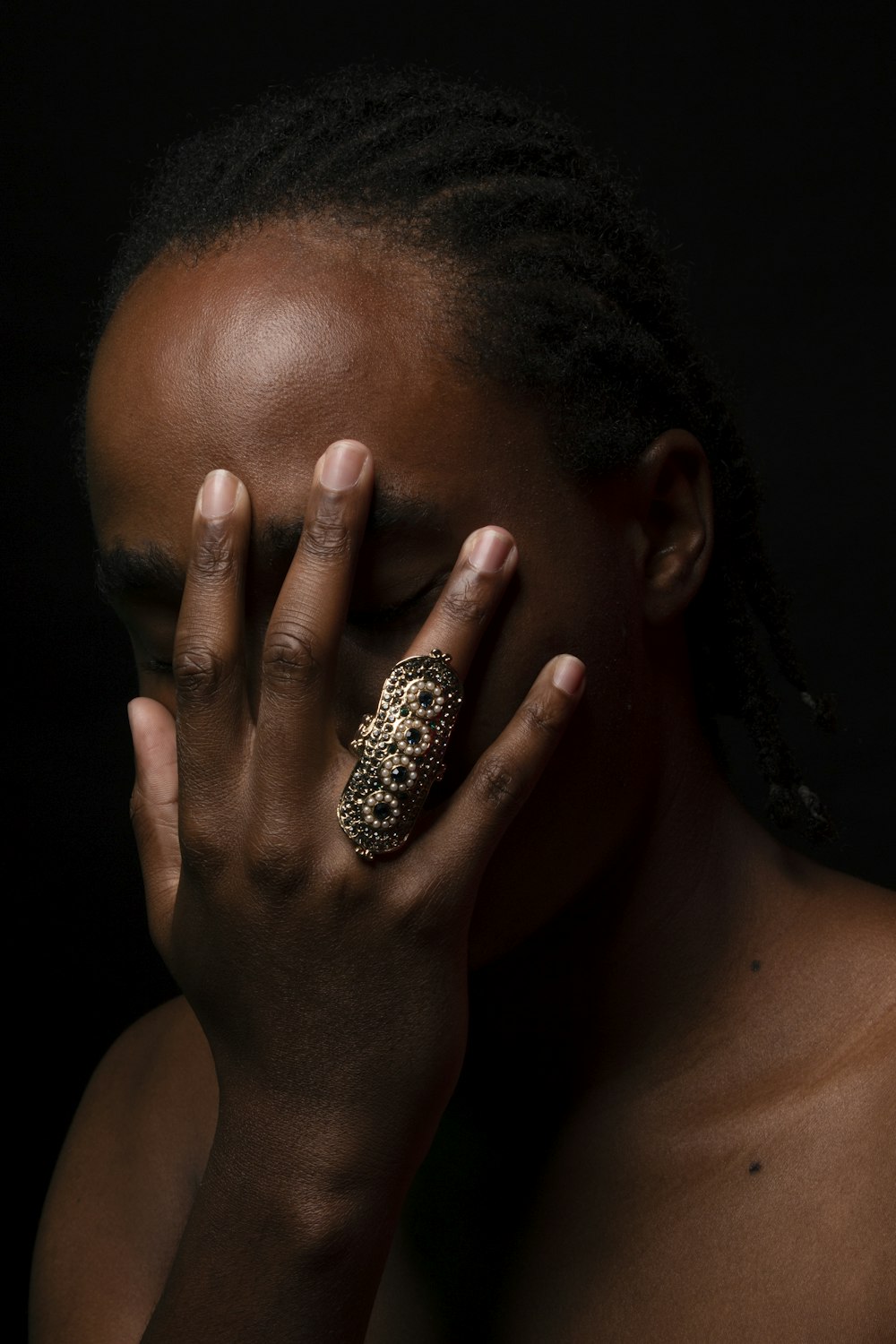 woman with black and silver manicure