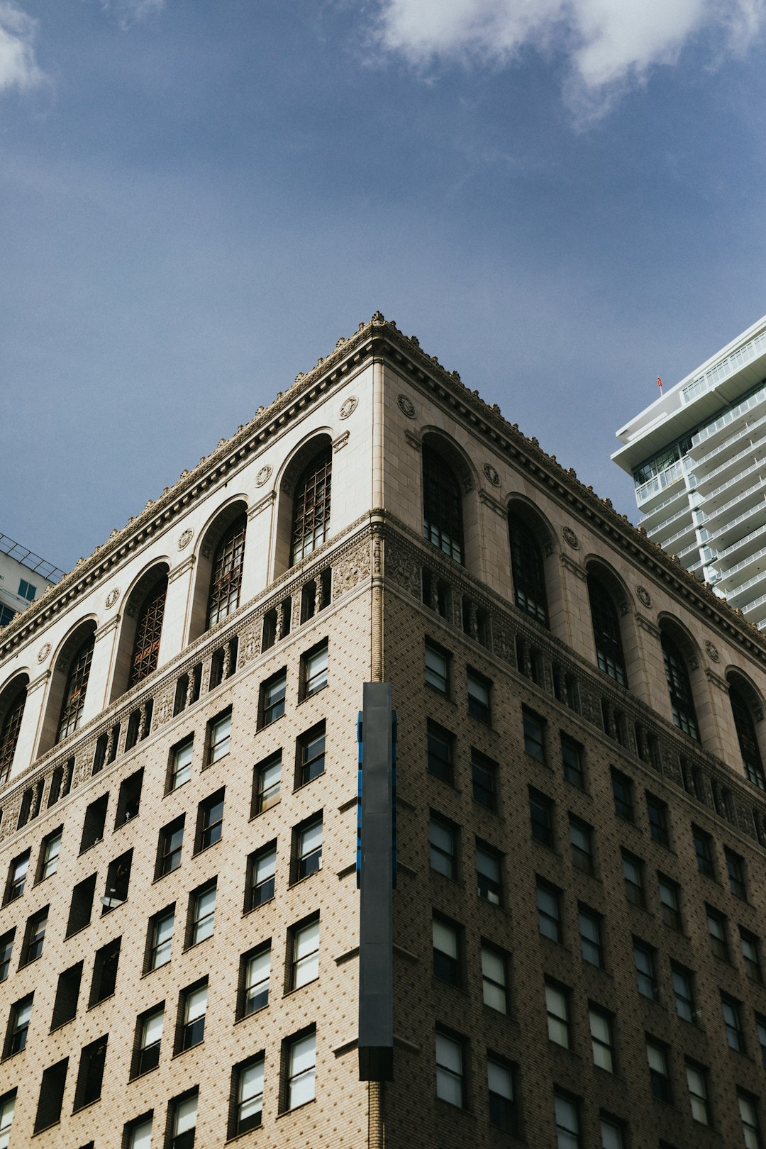 brown concrete building under blue sky during daytime