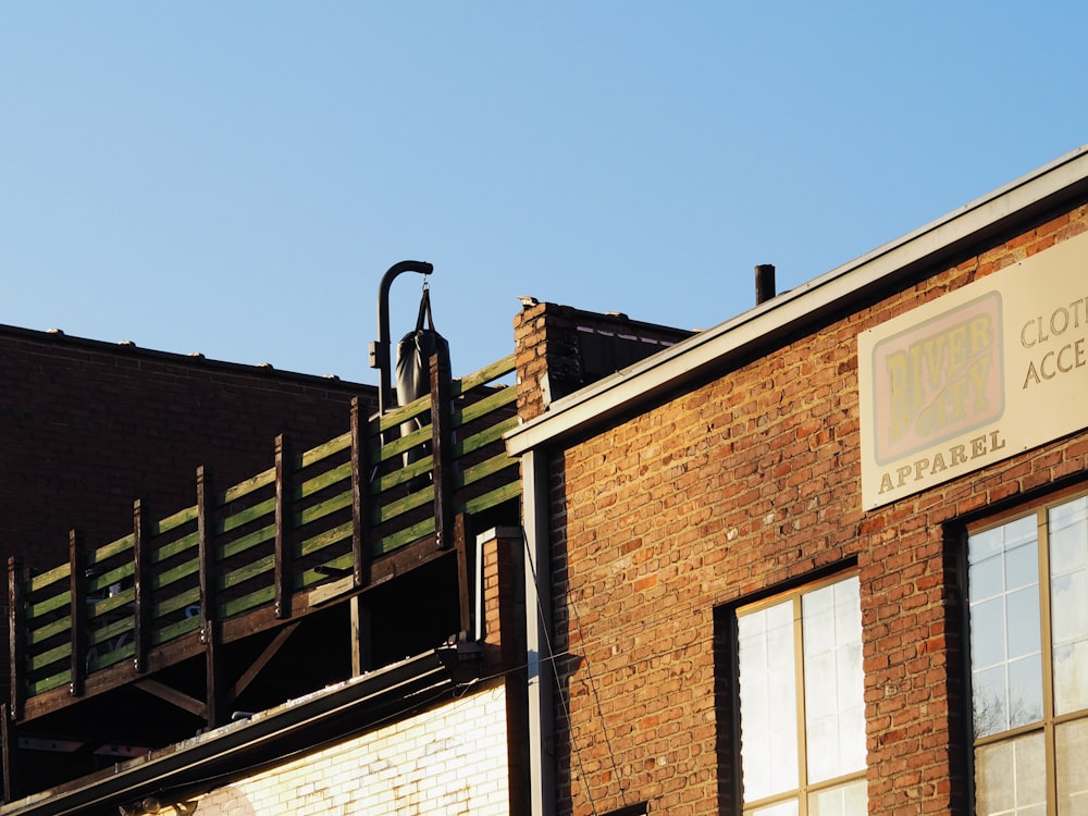 brown brick building under blue sky during daytime