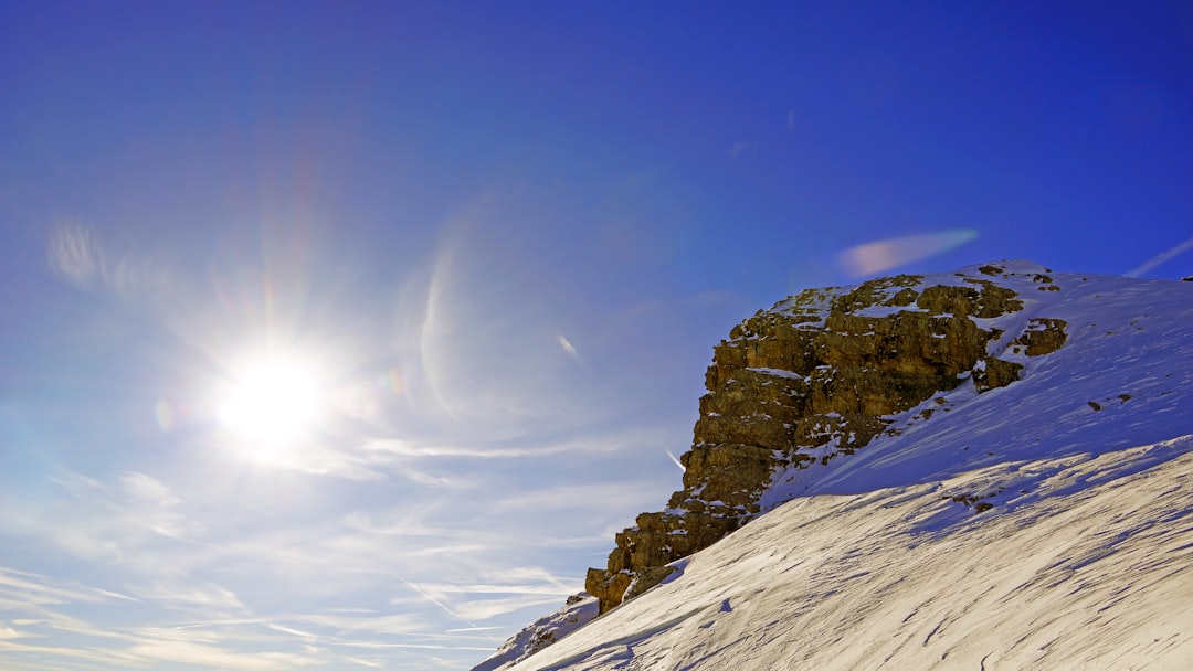 snow covered mountain under blue sky during daytime