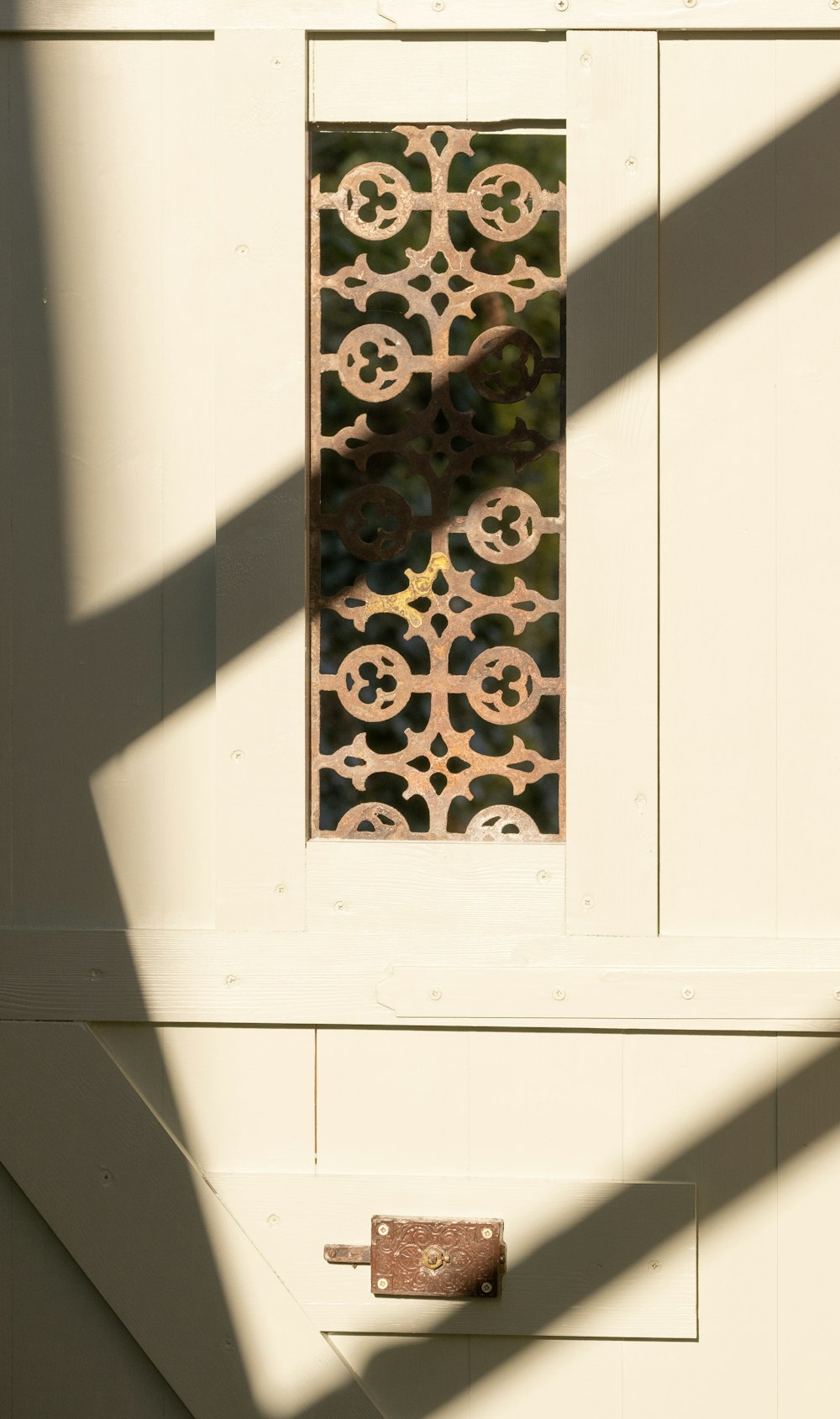 white wooden door with brown metal door lever