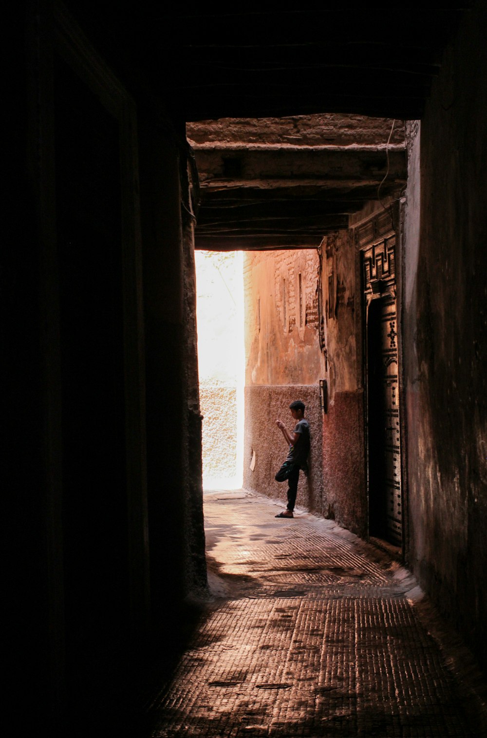 person walking on hallway during daytime