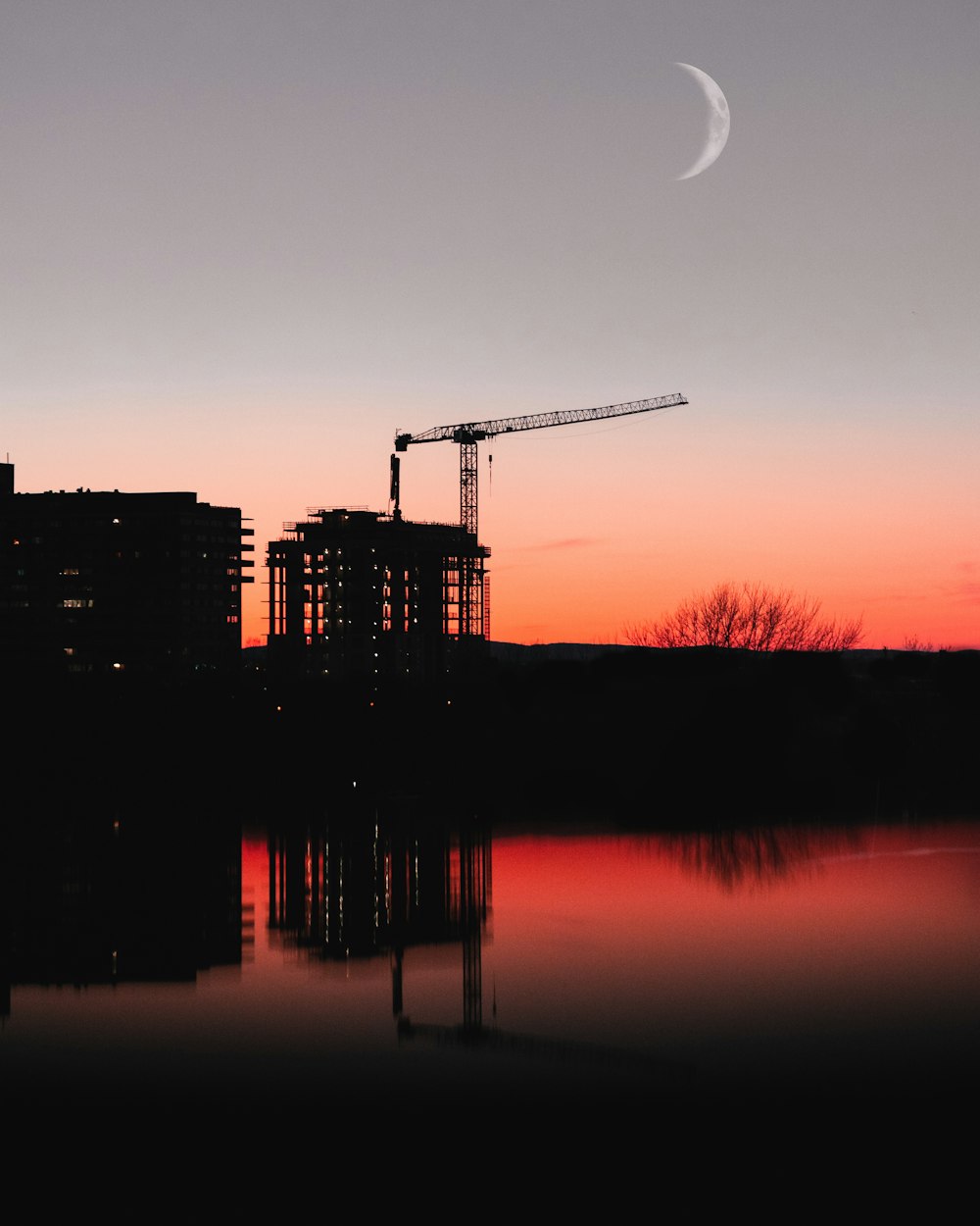 silhouette of building during sunset