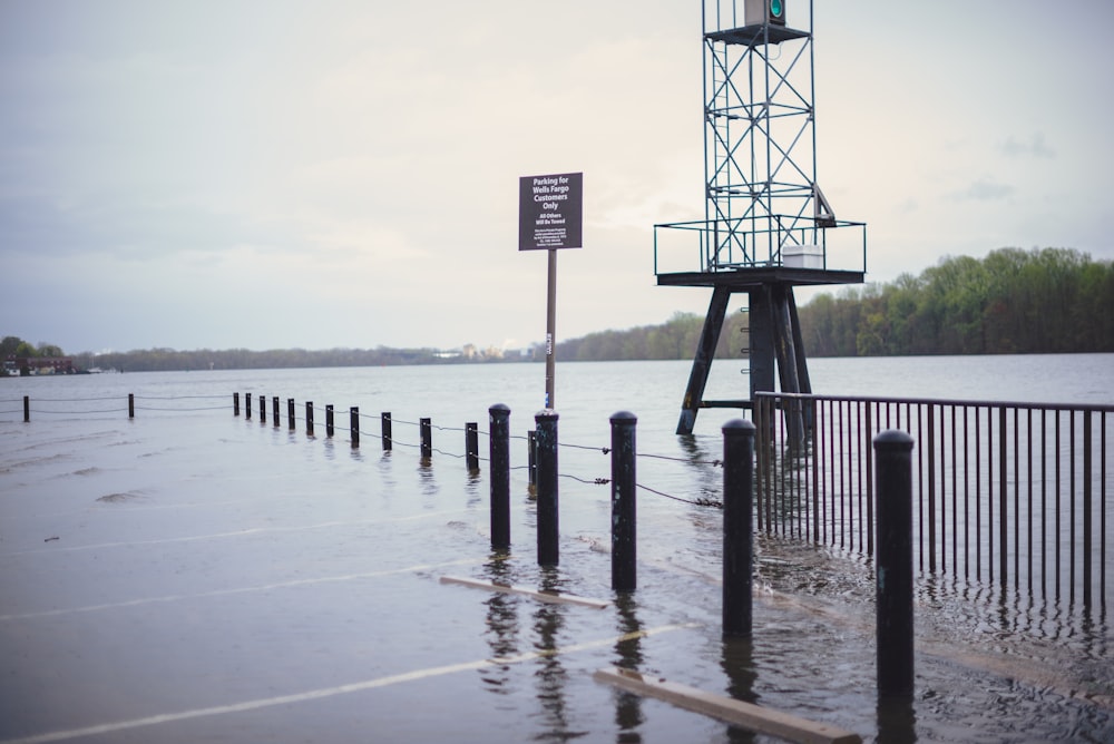 black wooden dock on sea during daytime