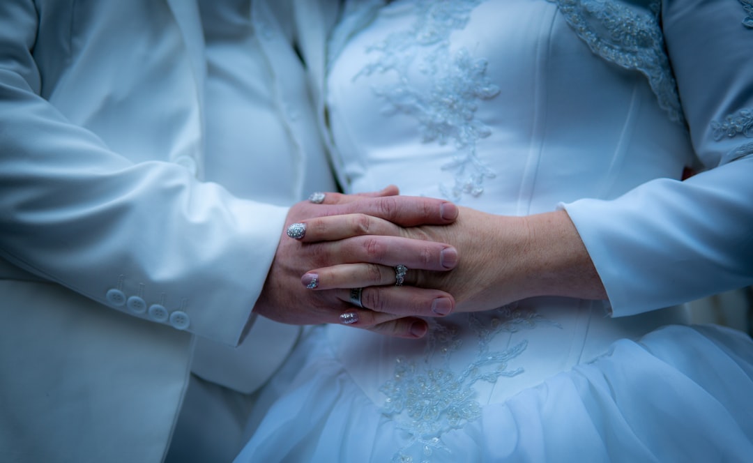 man and woman holding hands