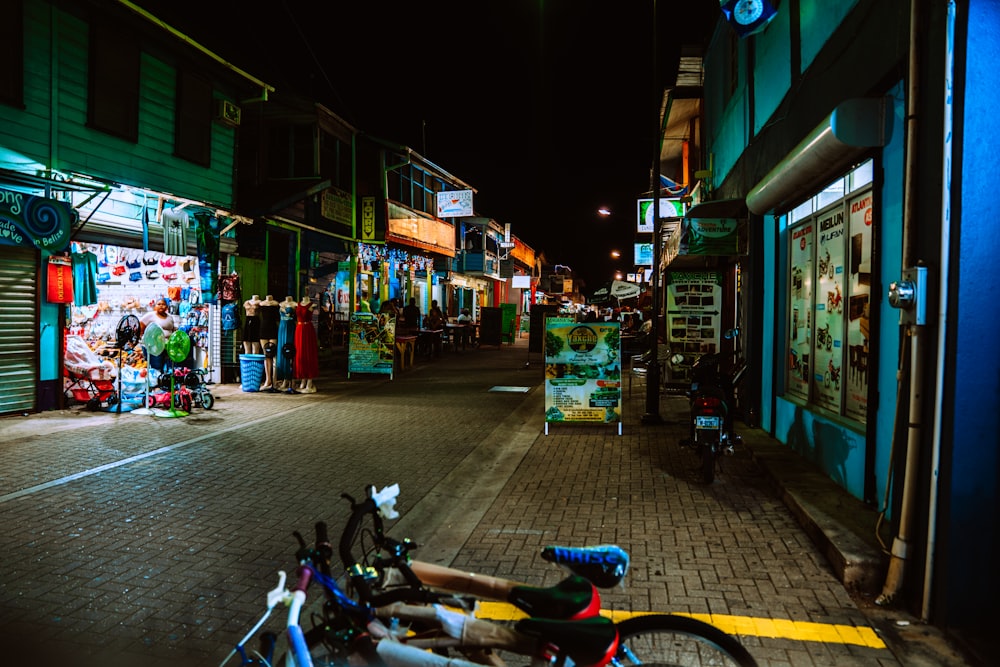 people walking on street during night time