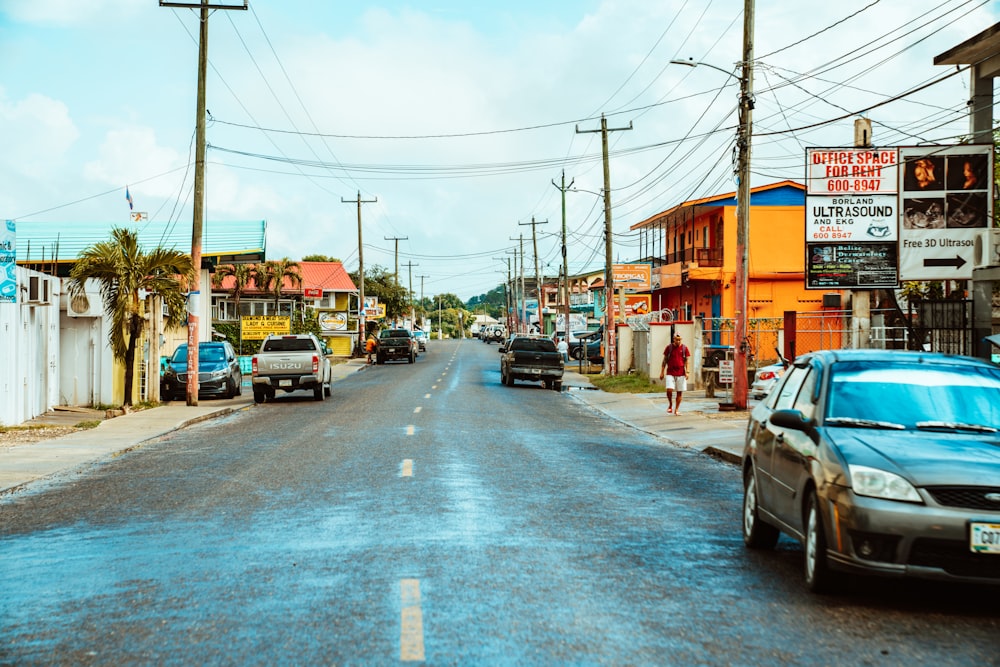 cars parked on side of the road during daytime