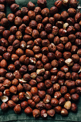 brown coffee beans in close up photography