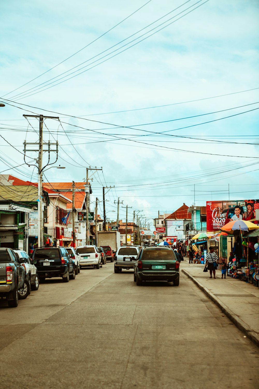 cars parked on side of the road during daytime